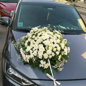 بوكيه سياره حجم كبير ورد جوري ابيض وبيبي فلاور